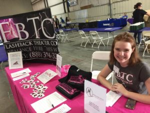 Company Manager Alex George sits at a Flashback table at the annual SKRECC picnic